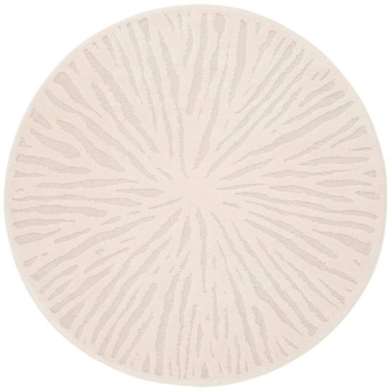 Tapis shaggy rond en polyester et polypropylène